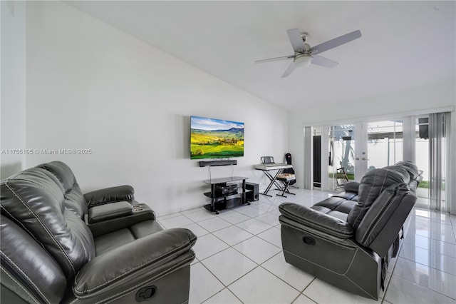 living area featuring ceiling fan, french doors, vaulted ceiling, and light tile patterned floors