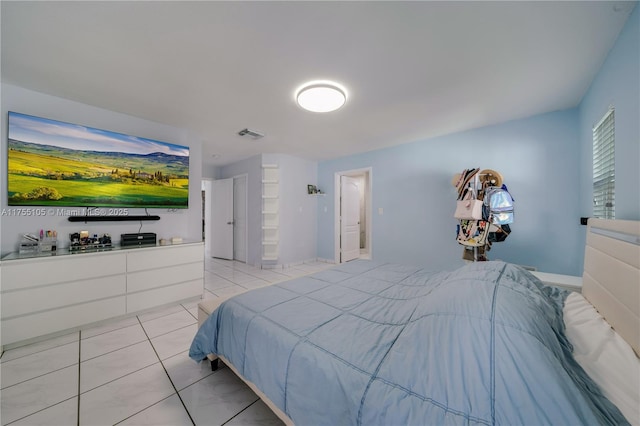 bedroom featuring light tile patterned flooring and visible vents