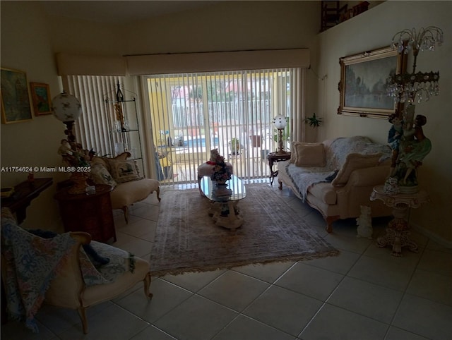 living area with tile patterned floors