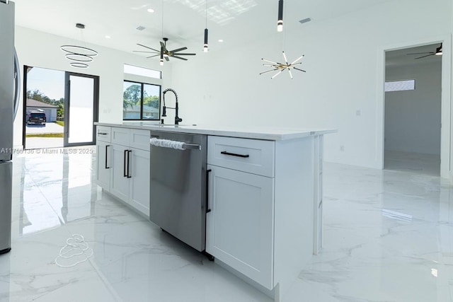 kitchen with a center island with sink, white cabinets, dishwasher, decorative light fixtures, and marble finish floor