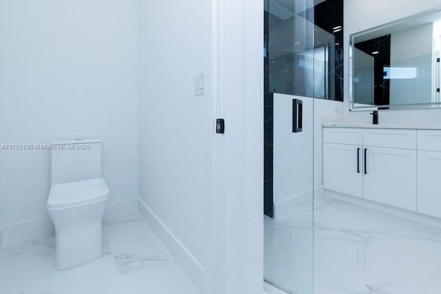 full bathroom with toilet, vanity, baseboards, marble finish floor, and a marble finish shower