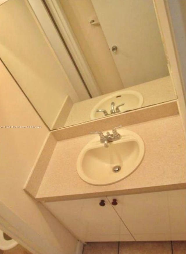 bathroom featuring vanity and tile patterned floors