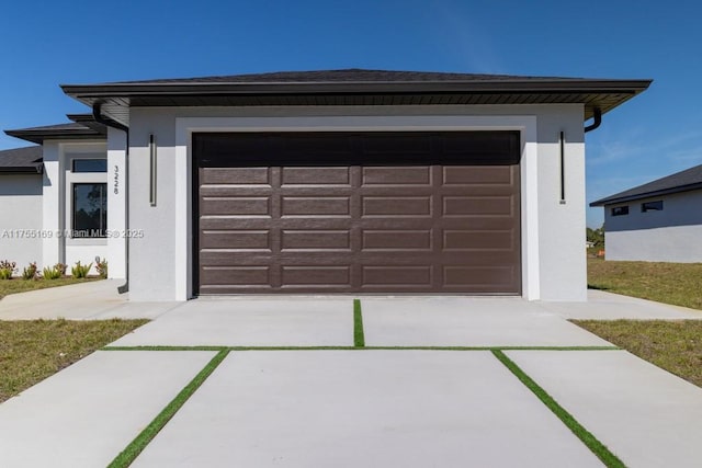 garage with driveway