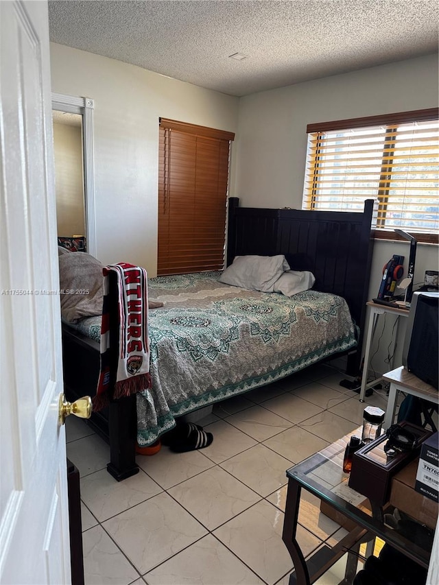 bedroom with a textured ceiling