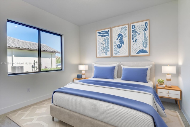 5007 Ofanto Ln, Ave Maria, FL 34142 - carpeted bedroom with baseboards