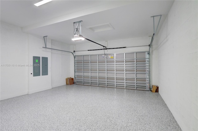 garage featuring electric panel and a garage door opener