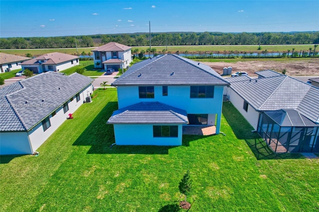 aerial view featuring a water view and a residential view