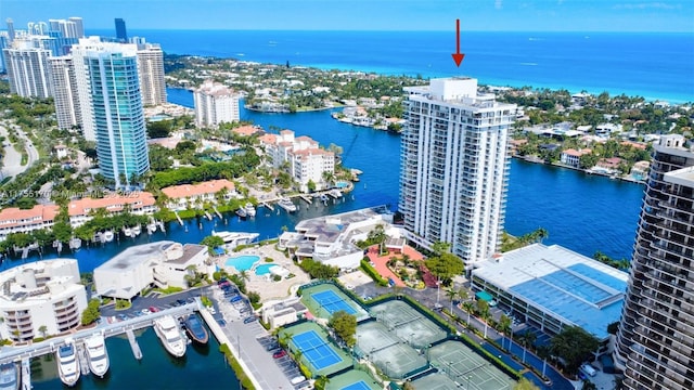 drone / aerial view with a view of city and a water view