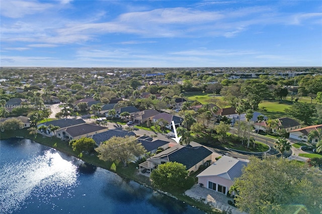 bird's eye view featuring a water view and a residential view