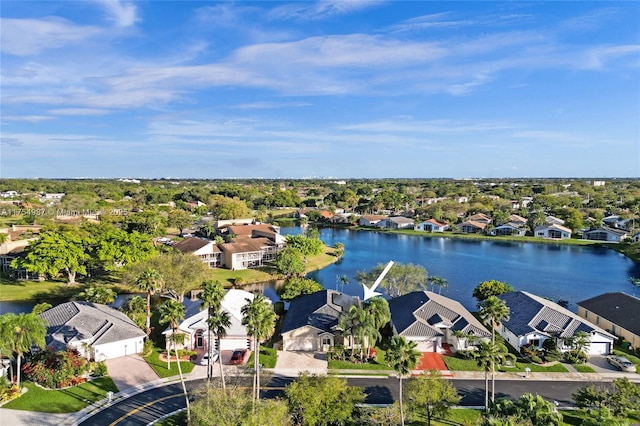 aerial view with a water view and a residential view