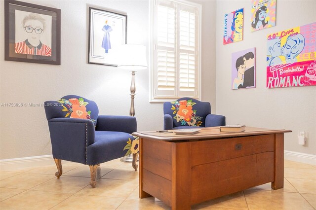 office with light tile patterned floors and baseboards