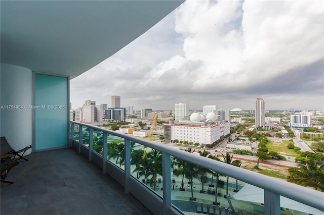 balcony featuring a city view