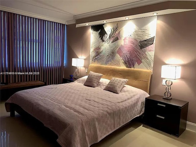 bedroom featuring ornamental molding