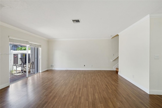 12611 SW 54th Ct Unit 12611, Miramar, FL 33027 - empty room featuring wood finished floors, ornamental molding, and stairway