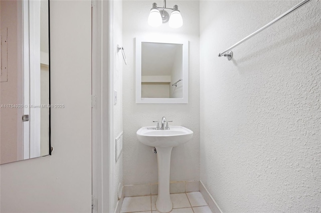 12611 SW 54th Ct Unit 12611, Miramar, FL 33027 - bathroom with tile patterned flooring and a textured wall