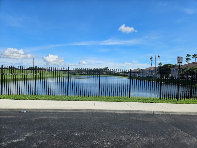 property view of water with fence