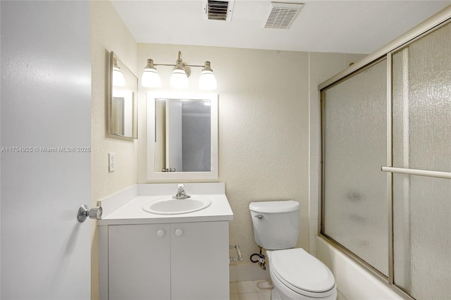 12611 SW 54th Ct Unit 12611, Miramar, FL 33027 - bathroom with vanity, enclosed tub / shower combo, and tile patterned floors