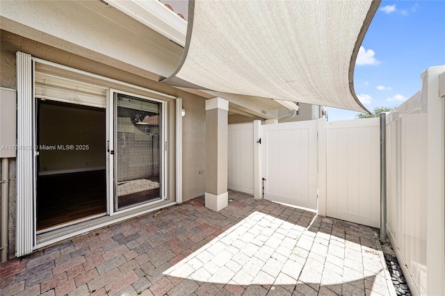12611 SW 54th Ct Unit 12611, Miramar, FL 33027 - view of patio / terrace with a gate