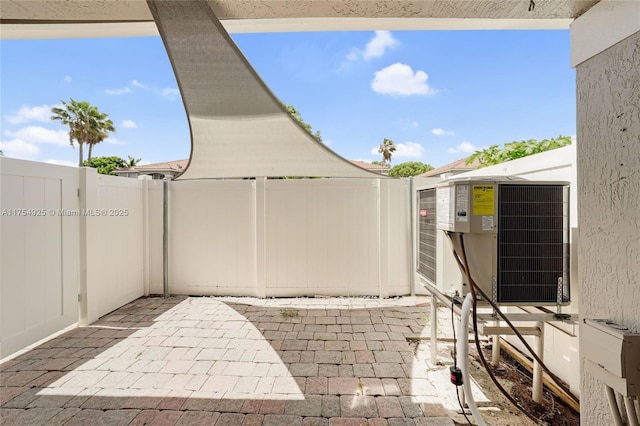 12611 SW 54th Ct Unit 12611, Miramar, FL 33027 - view of patio / terrace featuring a gate