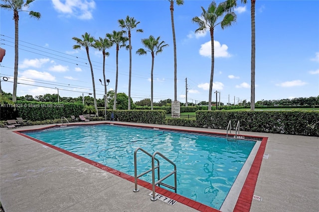 12611 SW 54th Ct Unit 12611, Miramar, FL 33027 - community pool featuring a patio