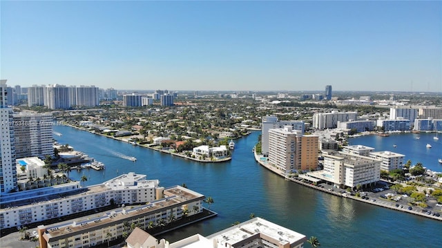 bird's eye view with a city view and a water view