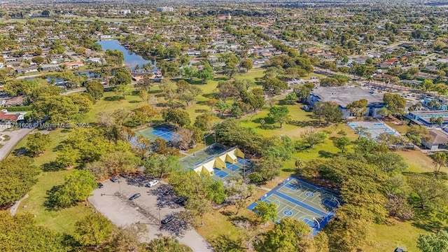 bird's eye view with a residential view and a water view