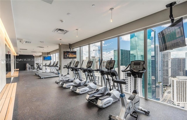 exercise room featuring visible vents