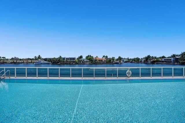 community pool with a water view