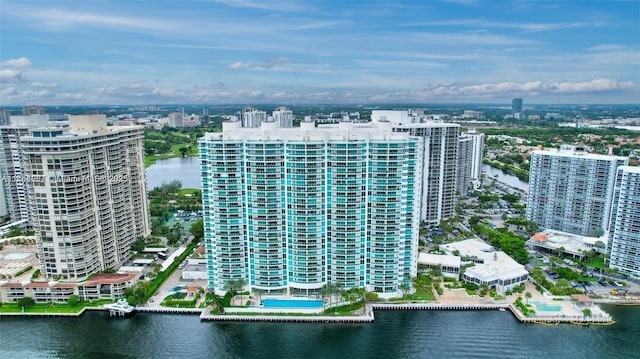 bird's eye view featuring a view of city and a water view