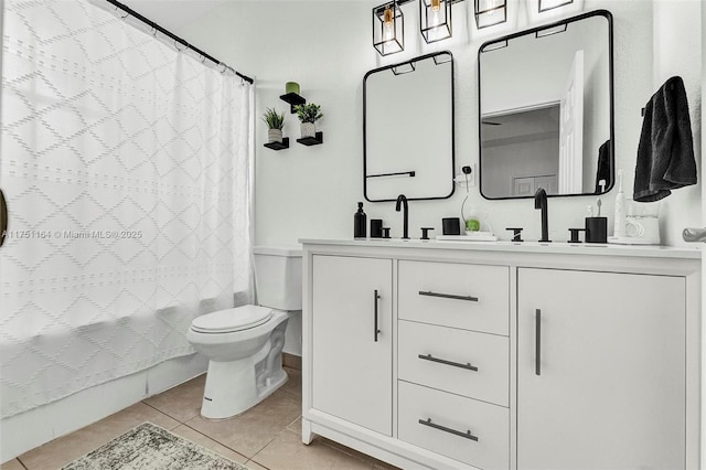 bathroom with double vanity, toilet, tile patterned flooring, shower / bath combo with shower curtain, and a sink