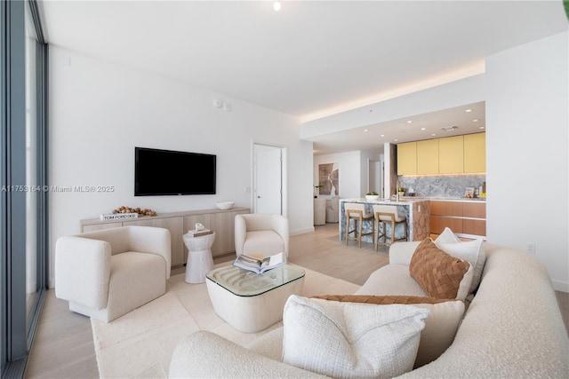 500 Alton Unit 3304, Miami Beach, FL 33139 - living area featuring light wood-style floors and baseboards