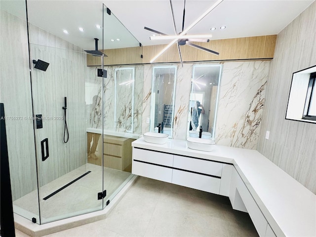 full bathroom featuring vanity, recessed lighting, and a marble finish shower