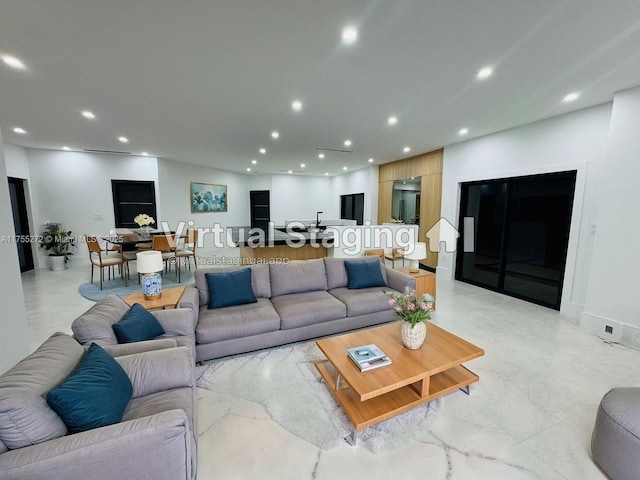 living room featuring recessed lighting