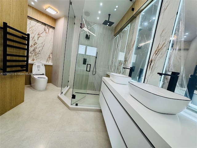 bathroom featuring recessed lighting, tile walls, a stall shower, and vanity