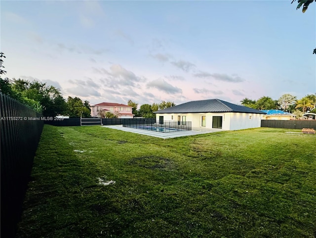 view of yard featuring a fenced backyard and a fenced in pool