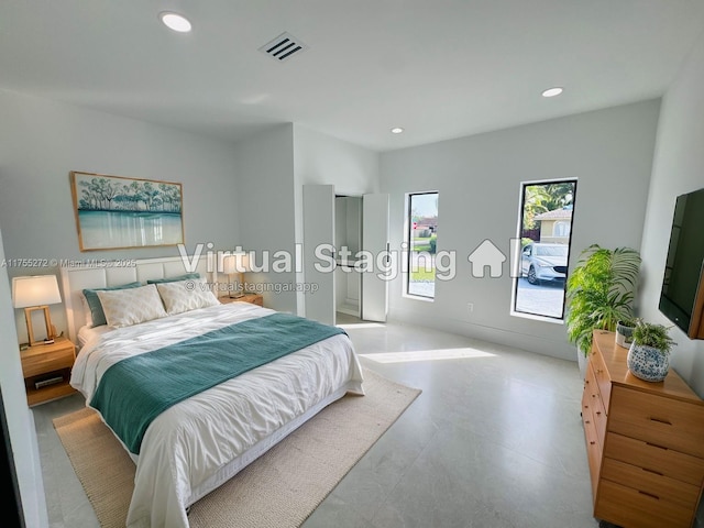 bedroom with visible vents and recessed lighting