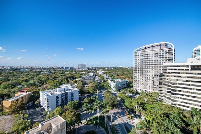 birds eye view of property featuring a city view