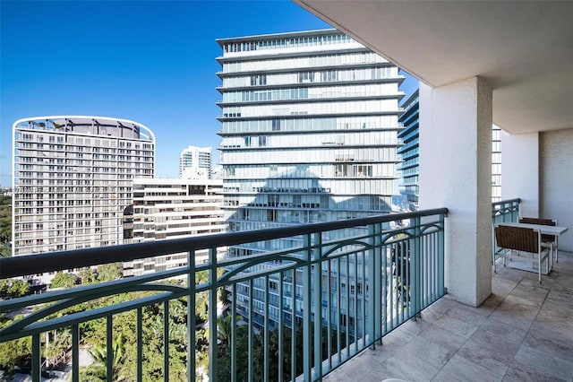 balcony featuring a city view