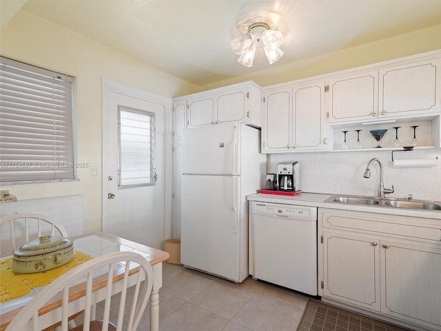 kitchen featuring light tile patterned floors, white appliances, a sink, light countertops, and open shelves