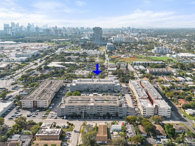 birds eye view of property featuring a view of city