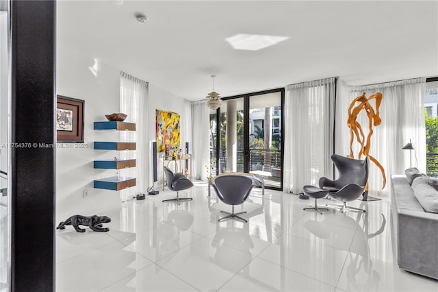 workout area featuring expansive windows and tile patterned floors