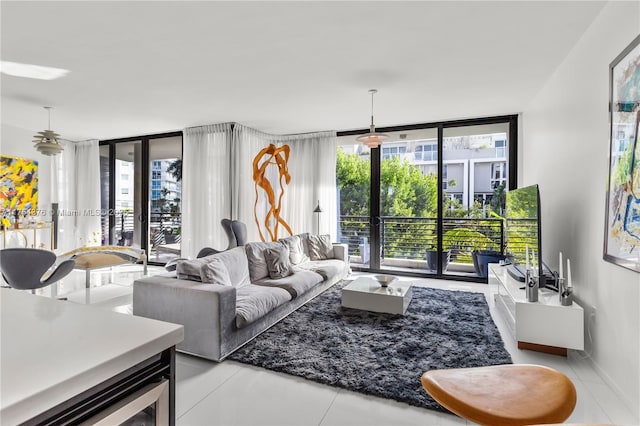 living room with floor to ceiling windows and plenty of natural light