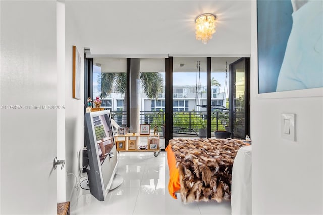 tiled bedroom featuring expansive windows