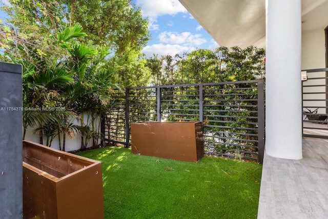 view of yard with fence