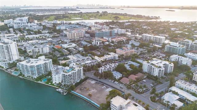 bird's eye view with a city view and a water view