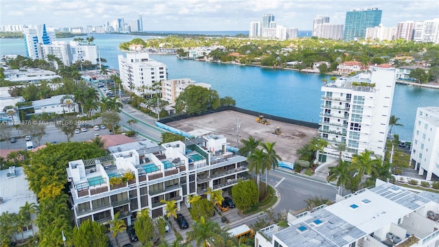 bird's eye view with a water view and a city view