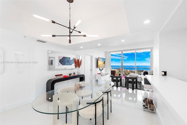 dining area featuring an inviting chandelier, light tile patterned flooring, visible vents, and recessed lighting