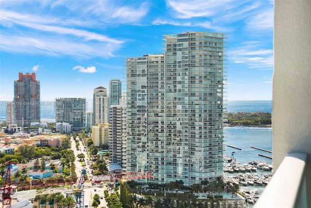 property's view of city featuring a water view