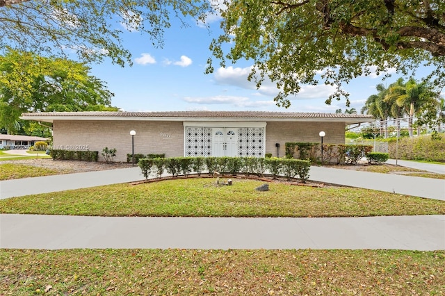 exterior space with a front yard