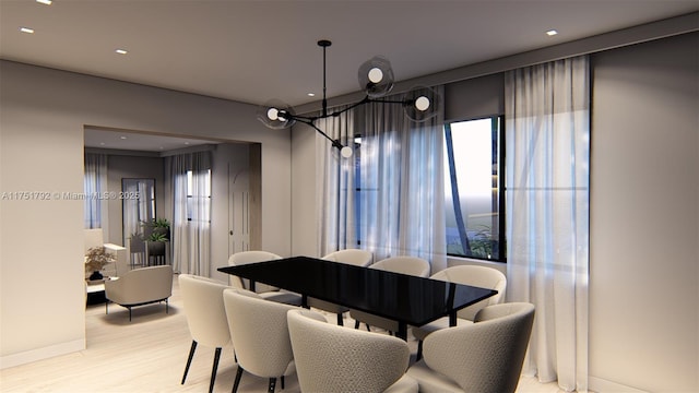 dining area featuring light wood-style flooring and recessed lighting
